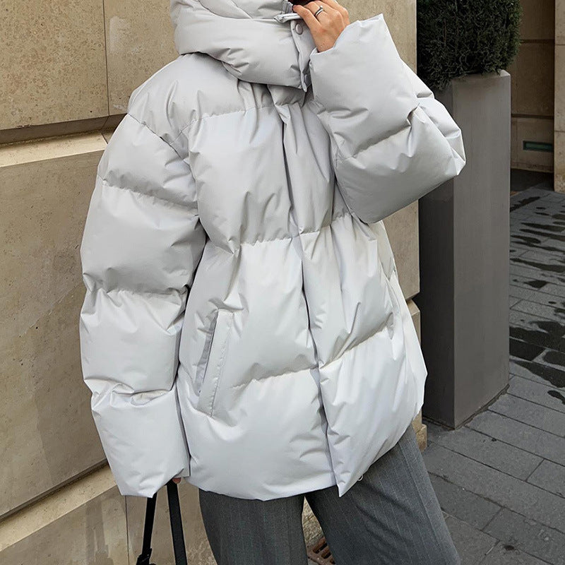 Damen - Pufferjacke - Hohem Kragen - Praktischen Taschen - Warm und stylisch für kalte Tage