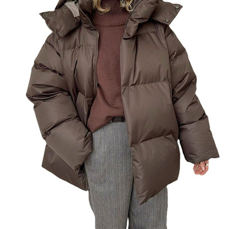 Damen - Pufferjacke - Hohem Kragen - Praktischen Taschen - Warm und stylisch für kalte Tage